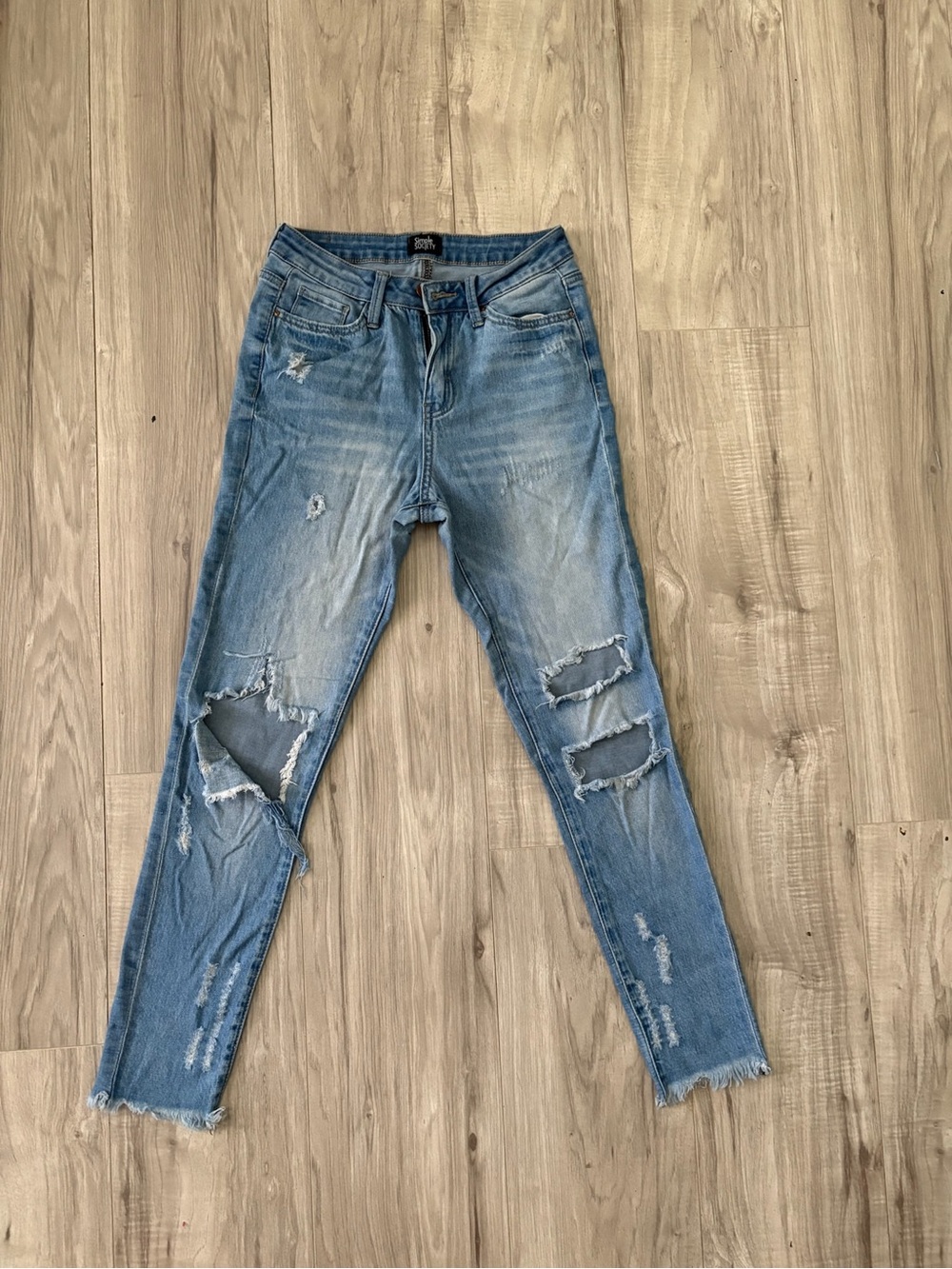 Distressed Light Blue Skinny Jeans for Women